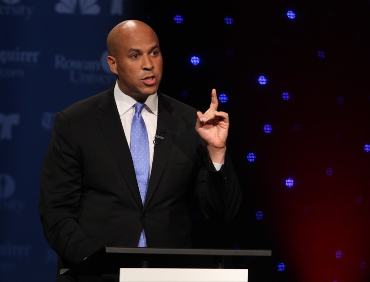 Cory Booker responds to a question during the second televised debate with Steve Lonegan at Rowan University in Glassboro, N.J., Oct. 9, 2013.