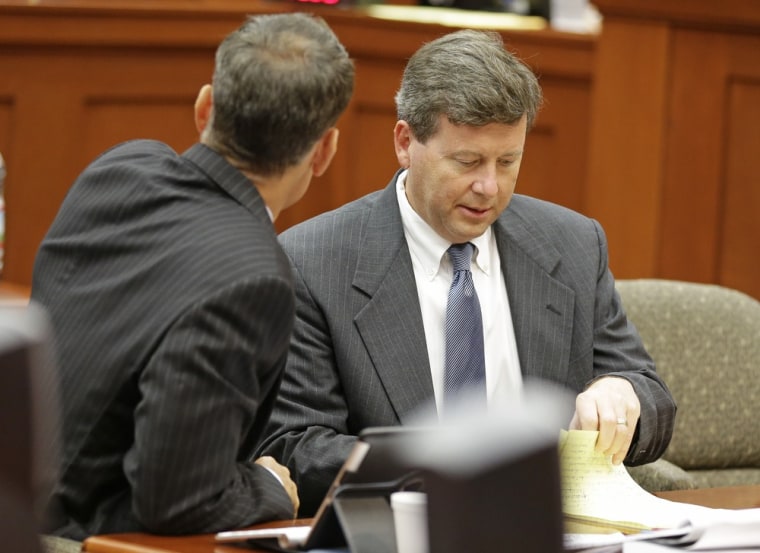 Kelly Mathis, right, in court in Sanford, Fla., during his trial last month.