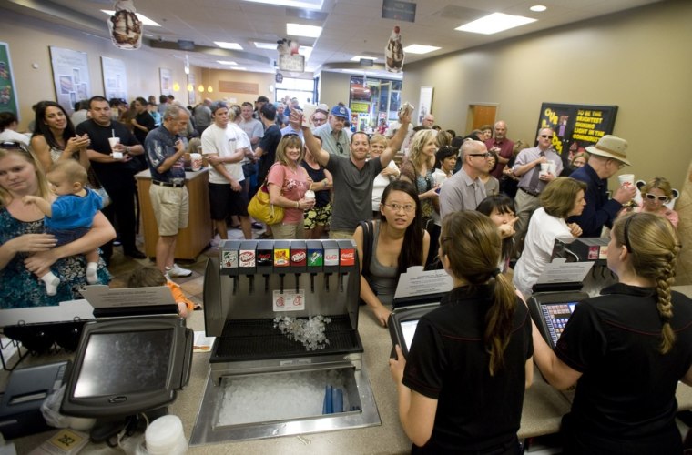 The Brea, Calif., Chick-fil-A is mobbed at lunchtime Aug. 1, 2013, as its supporters packed the chicken chain's restaurants after the company was criticized for an executive taking a public position against same-sex marriage. Former Arkansas Gov. Mike Huckabee, a Baptist minister, declared Wednesday