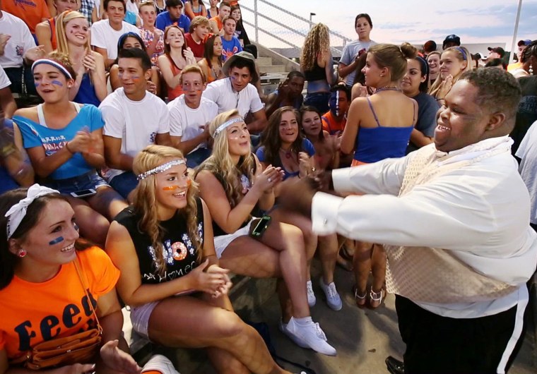 Bubba Hunter and Semone Adkins were crowned homecoming King and Queen at West Orange High School on Friday, October 11, 2013. Bubba works the audience...