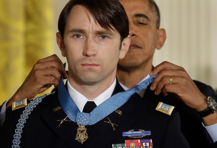 President Barack Obama awards the Medal of Honor to former Army Capt. William D. Swenson of Seattle, Wash., during a ceremony in the East Room at the White House in Washington, on Tuesday.