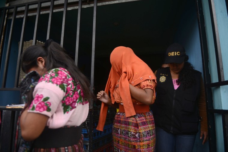 Teenage girls are among five women, 38 girls and one boy rescued from a house where they were held captive by a network of human trafficking and labor exploitation, in Villa Canales municipality, 25 km south of Guatemala City, on October 10.