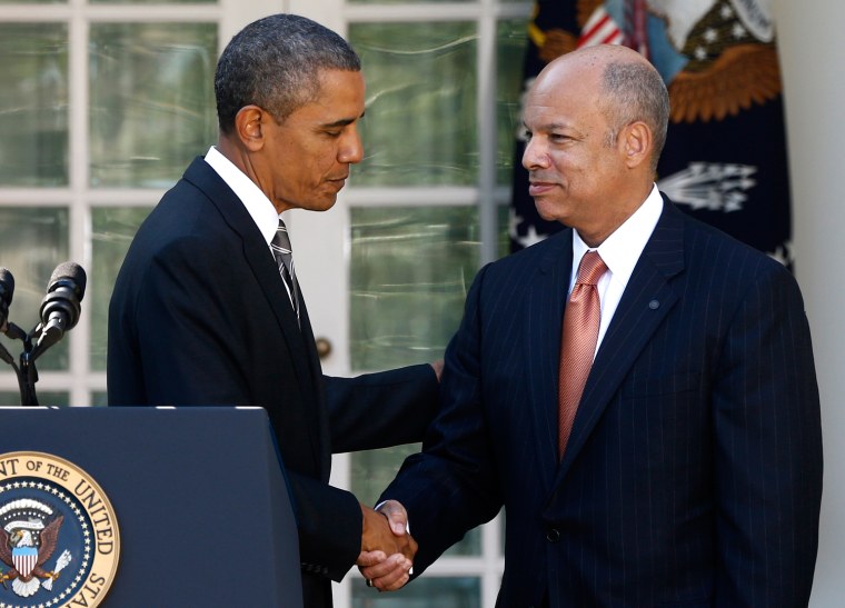 President Barack Obama shakes hands with Jeh Johnson, his choice for the next Homeland Security Secretary, in the Rose Garden at the White House on Friday.