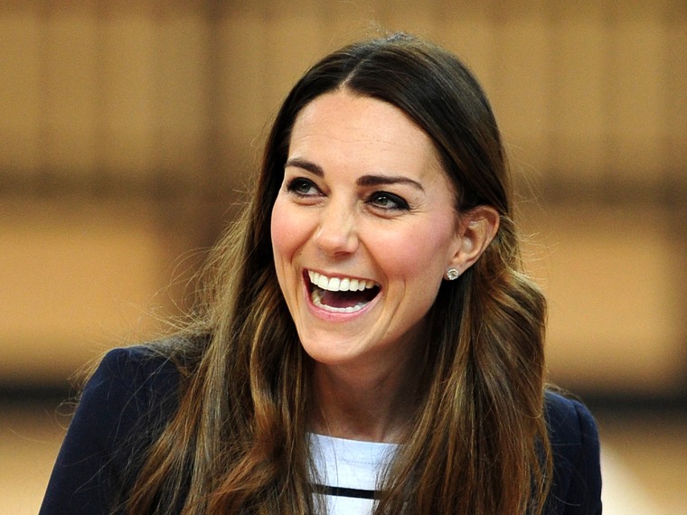 Britain's Catherine, Duchess of Cambridge laughs after participating in a volleyball game during a trip to the SportsAid Athlete Workshop in the Coppe...