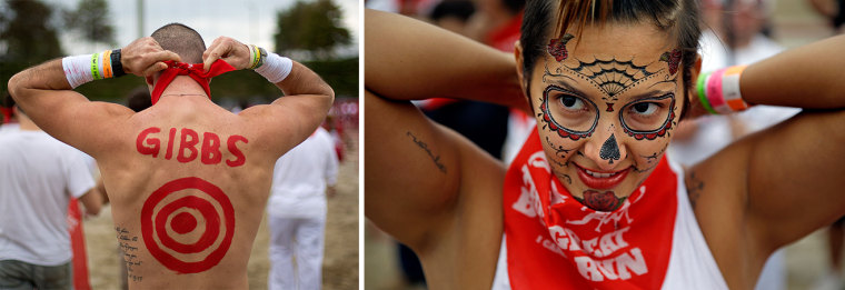 Colby Gibbs, of Kennesaw, Ga., left, ties a bandana around his neck.Jade Griffith, right, ties a bandana around her neck