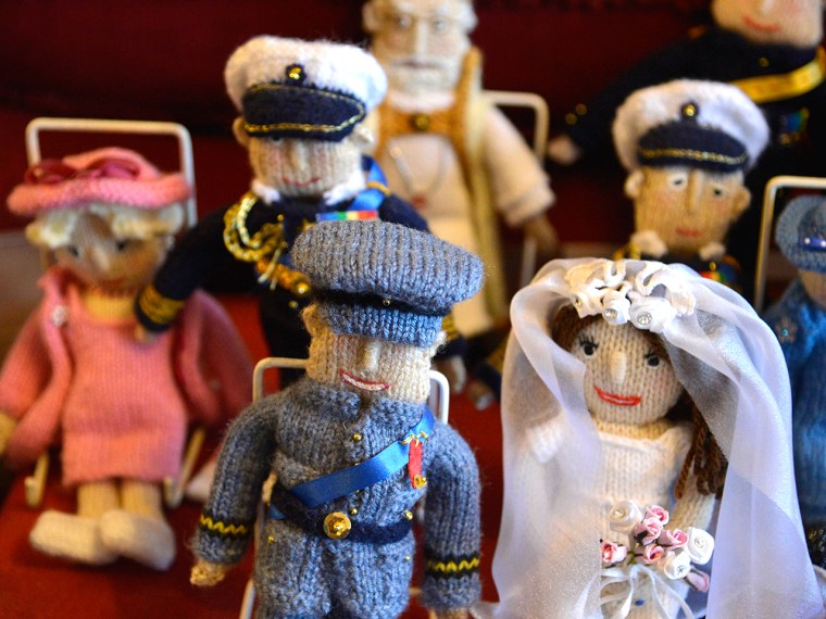 Image: Margaret Tyler's collection includes these commemorative puppets representing the wedding of Britain's Prince William and Duchess Kate.