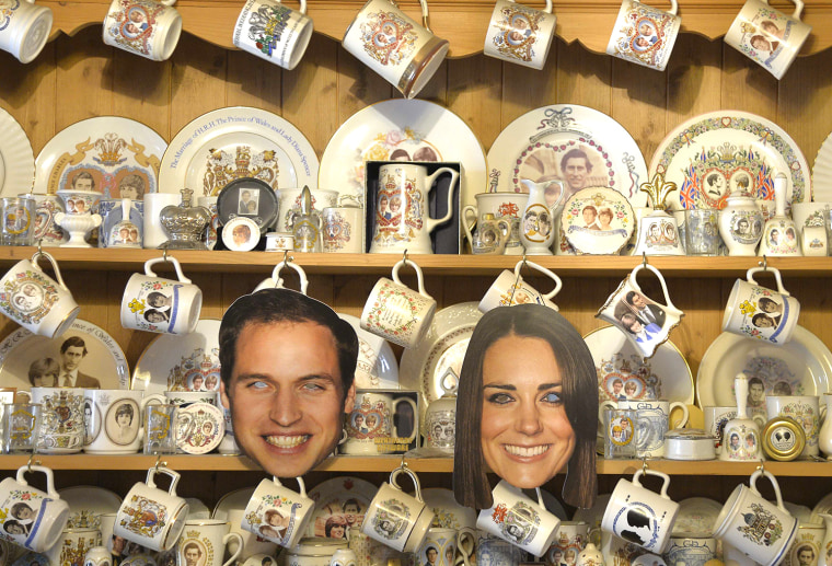 Image: A kitchen cabinet covered in commemorative crockery and face masks of Britain's Prince William and Duchess Kate can be seen at the London home of royal-family fan Margaret Tyler.