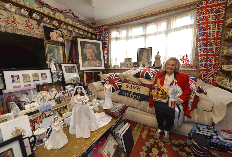 Image: Margaret Tyler sits in the front room of her London home, which she's transformed into a shrine to Britain's royal family.