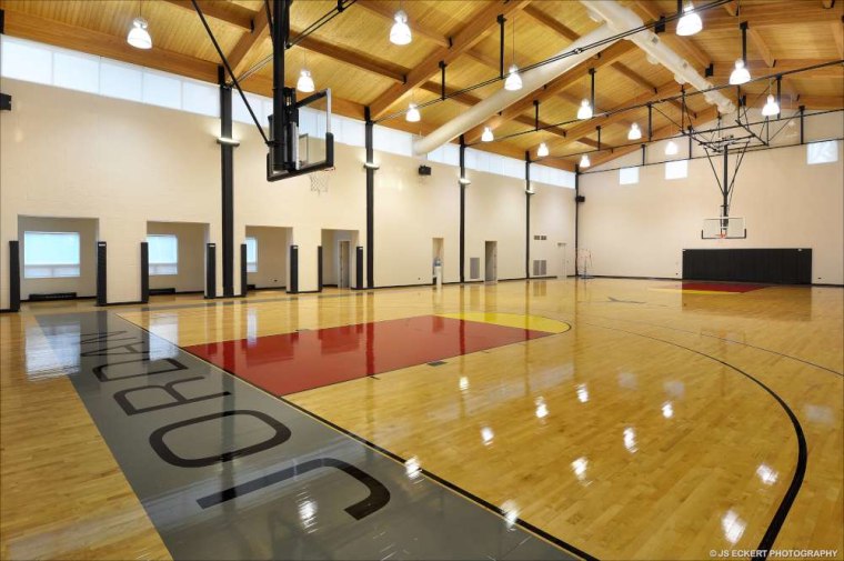 Among the many amenities in Michael Jordan's home is a full-size basketball court with locker room and viewing area.