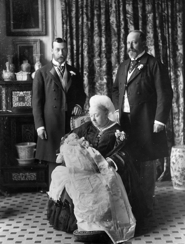 1894:  The christening of Prince Edward Albert of York (later King  Edward VIII, 1894 - 1972), with his father, grandfather and great grandmother. The...