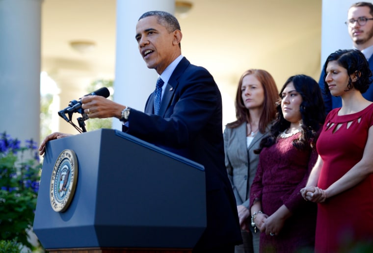 President Barack Obama delivers remarks on the implementation of the Affordable Care Act in the Rose Garden of the White House in Washington, DC, USA, 21 October 2013.