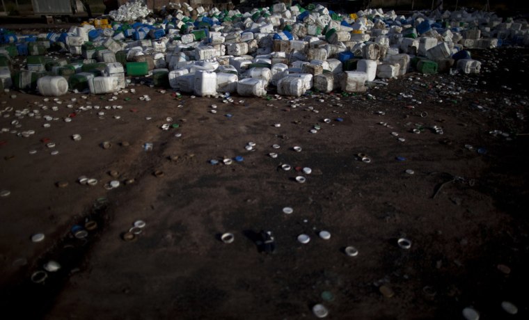 Empty agrochemical containers including Monsanto's Roundup products lay discarded at a recycling center in Quimili, Santiago del Estero province. Glyphosate, the key ingredient in Roundup, is used roughly eight to ten times more per acre than in the United States.