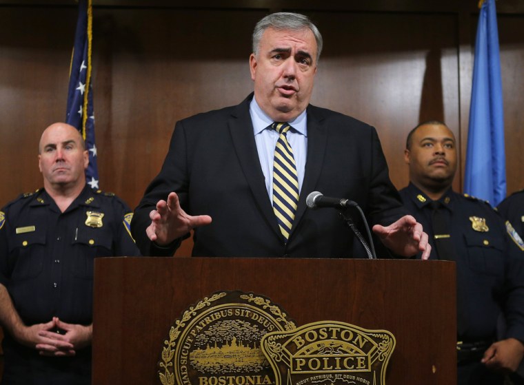 Boston Police Commissioner Ed Davis announces his impending retirement at a news conference on Sept. 23.