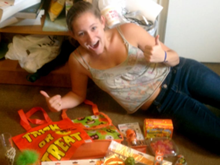 Leslie Schwed gives a thumbs up to the Halloween care package she got from her mom.
