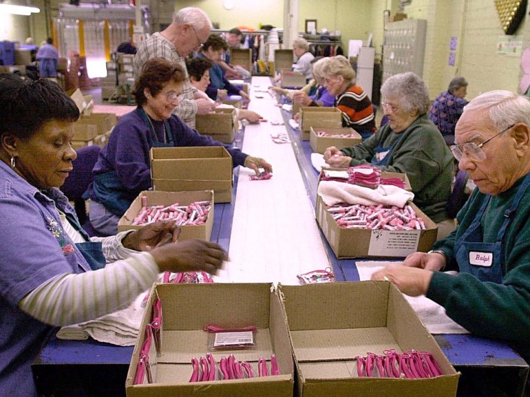 Workers in the senior section package cosmetics on the assembly line at the Bonne Bell cosmetics factory in Lakewood, Ohio, in this 2001 file photo. A new Wells Fargo survey found a large percentage of Americans expect to work until they die or get too sick to work.