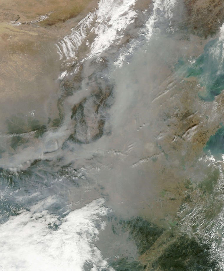 An Oct. 22 satellite image shows smog (gray) over eastern China.