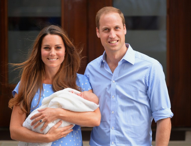 (FILES) - A picture dated July 23, 2013 shows Britain's Prince William, Duke of Cambridge, and his wife Catherine, Duchess of Cambridge, showing their...