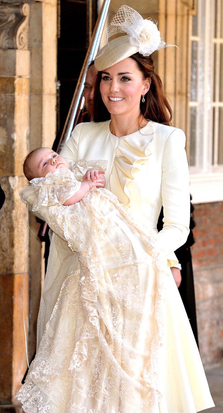 Kate Duchess of Cambridge carries her son Prince George after his christening at the Chapel Royal in St James's Palace in London, Wednesday Oct. 23, 2...