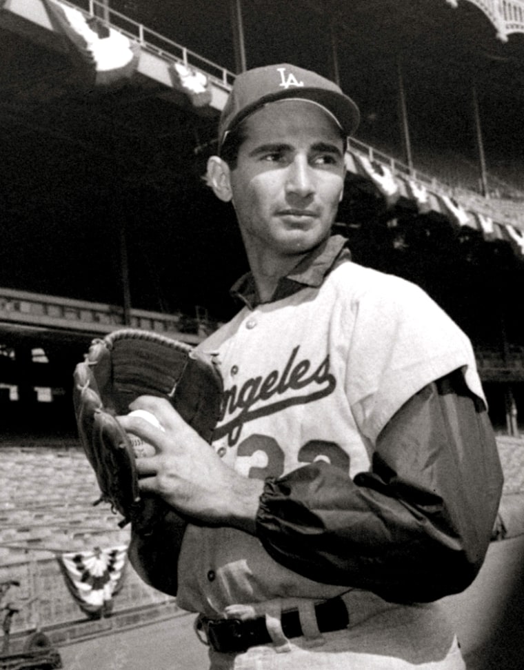Pitcher Sandy Koufax is shown during a workout at Yankee Stadium in New York, Oct. 1, 1963, the day before the Los Angeles Dodgers opened the World Series against the Yankees. Prices for tickets -- and everything else -- were a far cry from where they are today.