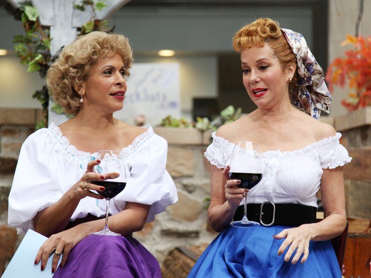 Kathie Lee and Hoda dressed up as actresses Lucille Ball and Vivian Vance - the iconic actresses of the classic TV show \"I Love Lucy.\"