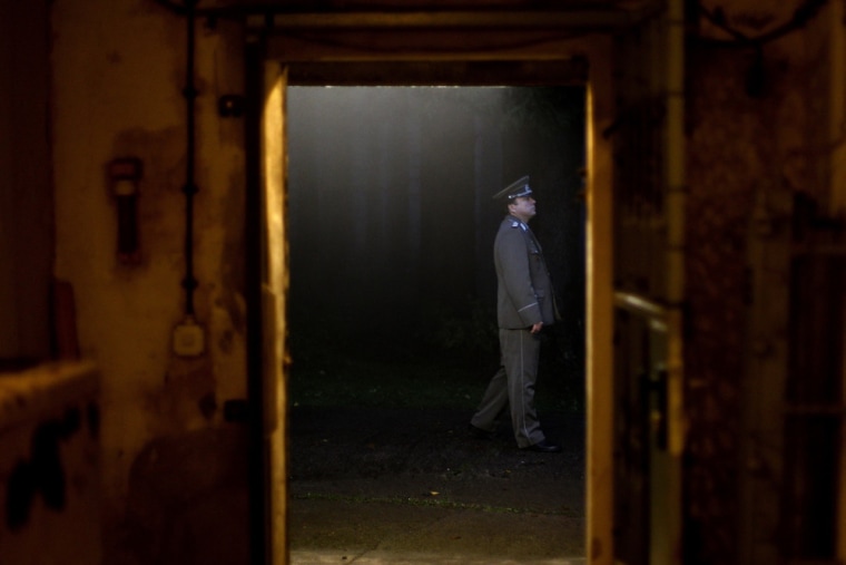 Thomas Krueger waits outside the bunker, dressed as an NVA major.