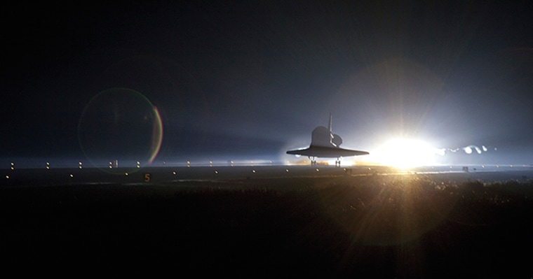After 30 years and 135 shuttle flights in total, the familiar and comforting lights at Kennedy Space Center guide Atlantis and her crew home for the last time on July 21, 2011. It was the 36th shuttle voyage to the International Space Station and the concluding flight of the space shuttle program.
