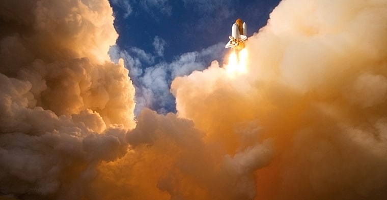 Atlantis emerges through a mountain of smoke after a successful launch from Kennedy Space Center on Nov. 16, 2009. The eleven-day mission featured three space walks and focused on providing new equipment to the International Space Station, including a spare gyroscope