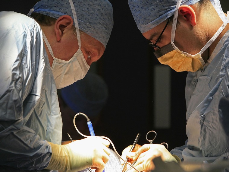 FILE: BIRMINGHAM, UNITED KINGDOM - JUNE 09: Consultant Surgeon Andrew Ready and his team conduct a live donor kidney transplant at The Queen Elizabet...