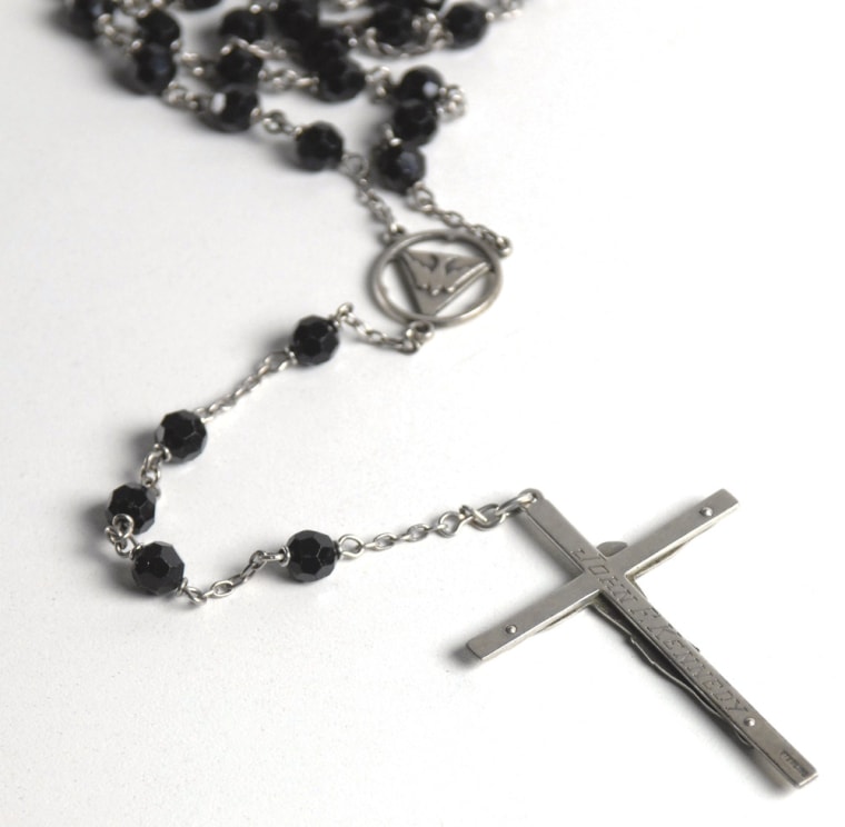 U.S. President John F. Kennedy's personally used rosary showing signs of constant use.