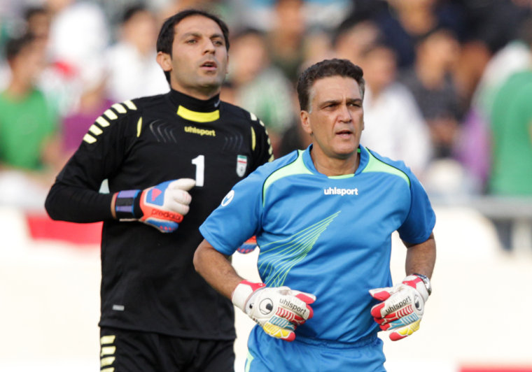 Goalkeeping coach Dan Gaspar, right, with Iran's goalkeeper Rahman Ahmadi.