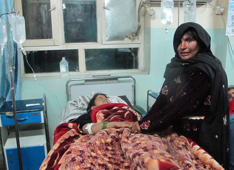 An Afghan girl who was injured in a bomb blast receives medical treatment at a hospital in Ghazni, Afghanistan, 27 October 2013.