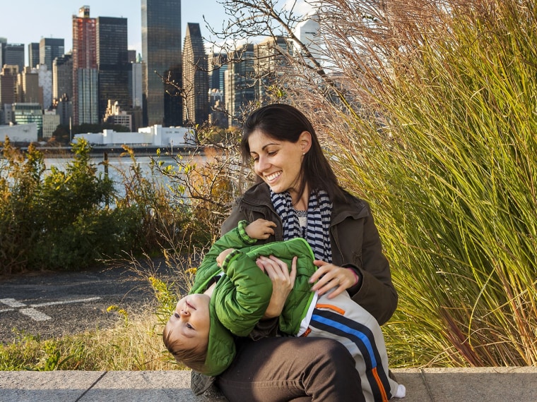 Tamar Weinstock poses for a portrait with her son Stone at Gantry Plaza State Park on Sunday in Queens, N.Y.