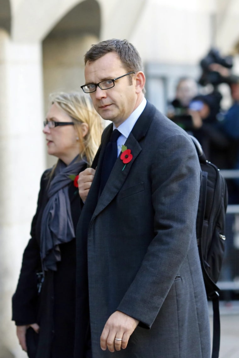Ex-editor of British newspaper The News of the World and former communications director under British Prime Minister David Cameron, Andy Coulson, arrives at court in London on Monday.