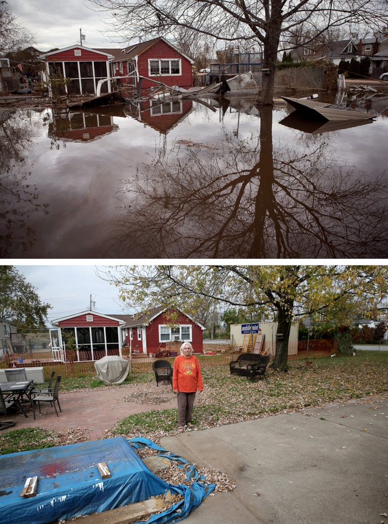 Before and after: The top photo shows water flooding a neighborhood Nov. 1, 2012, in the Ocean Breeze area of Staten Island. At bottom, Janet Hague stands in her back yard on Oct. 17 in the same area.