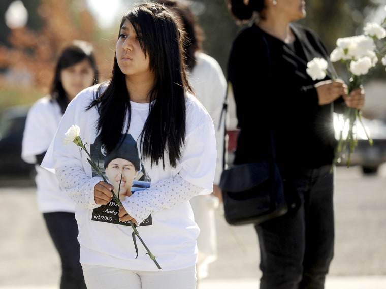 Mourners arrive at an open casket viewing for Andy Lopez Cruz in Windsor, Calif., on Sunday.