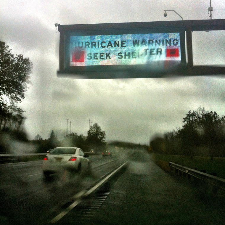 Photographer Ed Kashi traveled south on the Garden State Parkway on Oct. 29, 2012, toward Superstorm Sandy, greeted by signs flashing ominous warnings of the impending storm. His mind raced about where best to photograph the storm and still be safe while still worrying about his home and community.