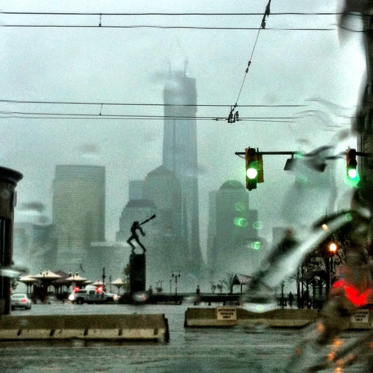 Looking toward Manhattan's One World Trade Center across the Hudson River from the Katyn Memorial in Jersey City, as Superstorm Sandy hit the East Coast on Oct. 29, 2012.