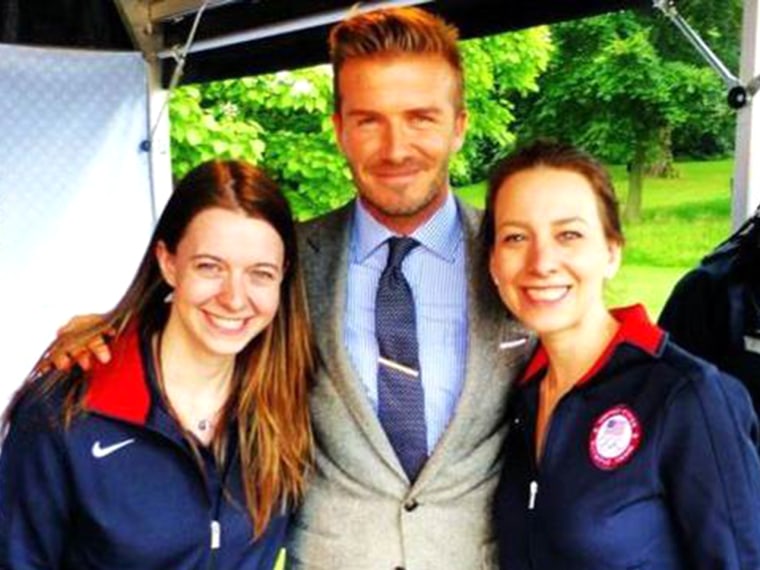 Former Olympian Sarah Hughes, right and her sister Emily, also an Olympic figure skater, show off one of the perks of being an accomplished athlete: Meeting the likes of David Beckham at the 2012 Summer Games.