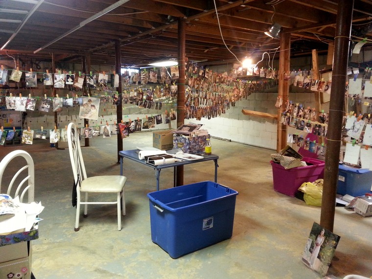 Van Houten set up this workspace in her cousin's basement, where she carefully cleans the images she's found.