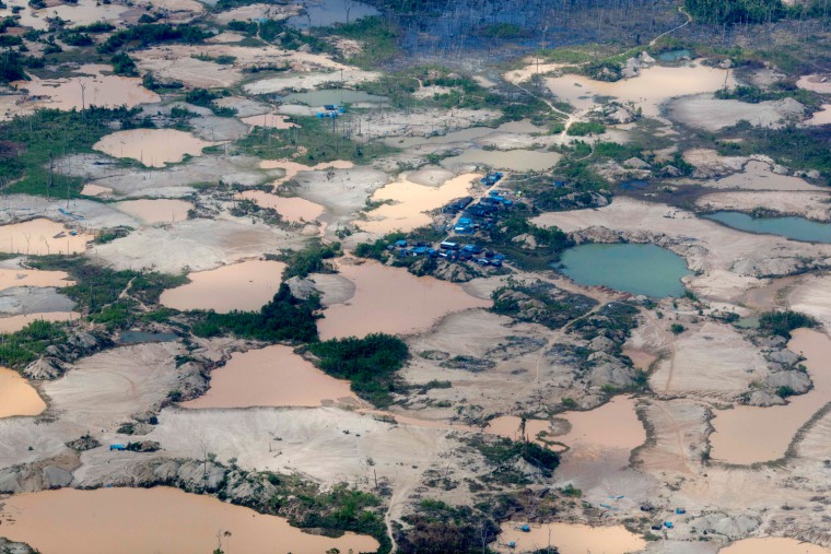 This Sept. 13, 2013 aerial photo shows tailings produced by informal mining in Peru's Madre de Dios region. The new research conducted by Carnegie Institution for Science found mercury levels above acceptable limits in 76.5 percent of the people living in the Madre de Dios region, both rural and urban populations.