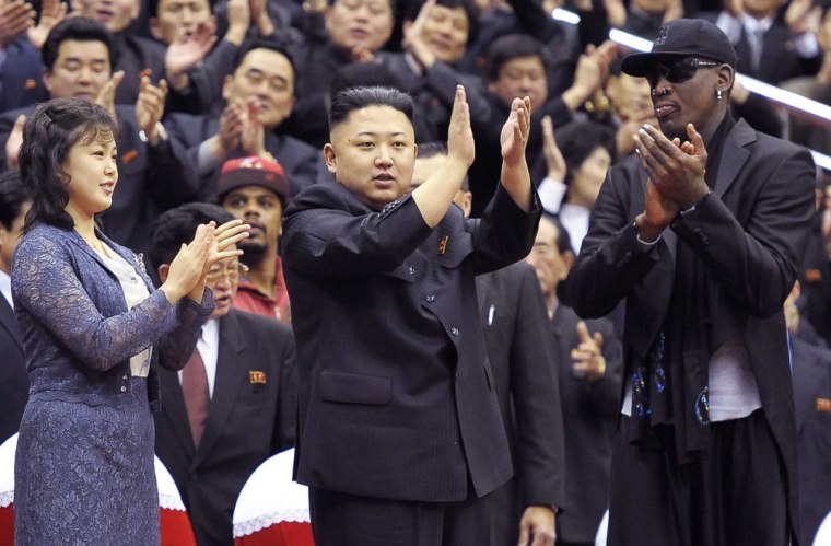 North Korean leader Kim Jong Un, his wife Ri Sol Ju and former NBA star Dennis Rodman clap during a basketball game between the Harlem Globetrotters team and North Korean University of Physical Education players in Pyongyang on Feb. 28.