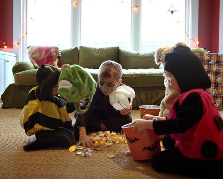 Sharing Halloween Candy, trick or treat, costumes, kids, children, october, home