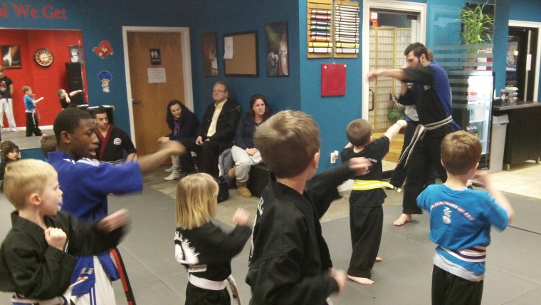 Christopher Pollak trains students in martial arts at a studio in New Jersey.