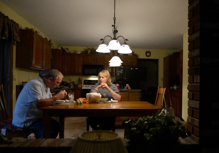 Mark and Kristine Jockel eat chili dinner at their home Wednesday, October 30, 2013 at their home in Monaca, Pa. Julia Rendleman/Getty Images
