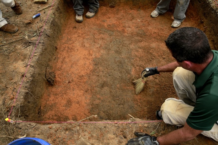 A team of anthropologists from the University of South Florida begin exhuming suspected graves on Saturday at the now closed Arthur G. Dozier School for Boys in Marianna, Fla.