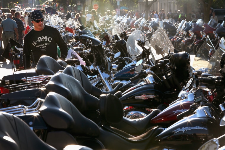 Motorcycles line the streets near the Summerfest grounds where enthusiasts were gathering to celebrate Harley-Davidson's 110th anniversary on August 31, 2013 in Milwaukee, Wis.