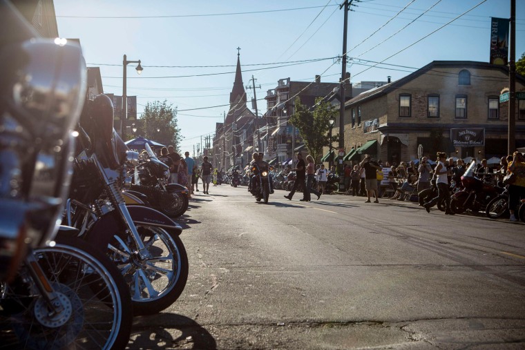 Harley-Davidson riders attend the Brady Street Block Party during the 110th Anniversary Celebration in Milwaukee, Wis.