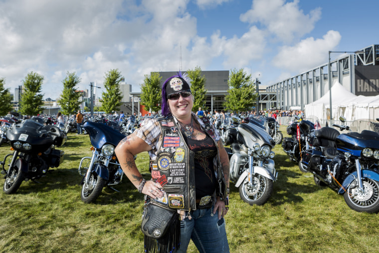 Trisha Young, of Joilet, Ill., poses for a picture during a Harley-Davidson Museum event in Milwaukee, Wis.