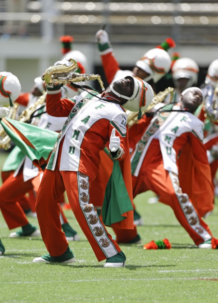 The Florida A&M University band performs Sunday, Sept. 1, 2013, in Orlando, Fla., during FAMU's season-opening football game against Mississippi Valley State, its first appearance in a football stadium in nearly 22 months after the 2011 hazing death of a drum major.