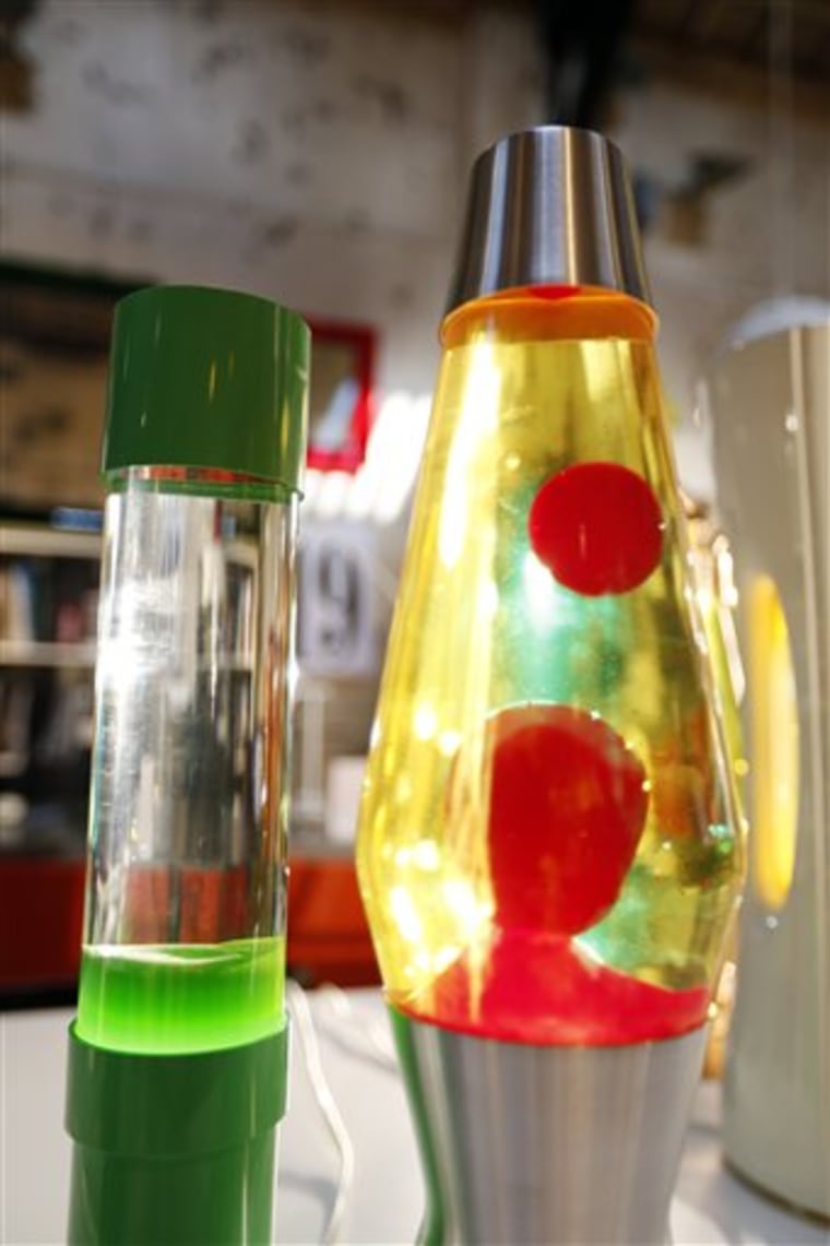 In this Monday, Aug. 19, 2013, lava lamps are photographed in a shop in London. The lava lamp, an iconic piece of British design and social trends, is...